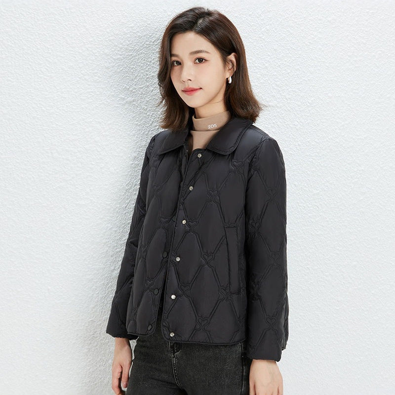 Women Short Cut Quilted Jacket with Decorative Stitching and Rounded Hem Mune Fashion
