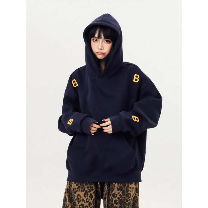 Unisex Oversized Hoodie with large intarsia block print and ribbed hem Mune Fashion