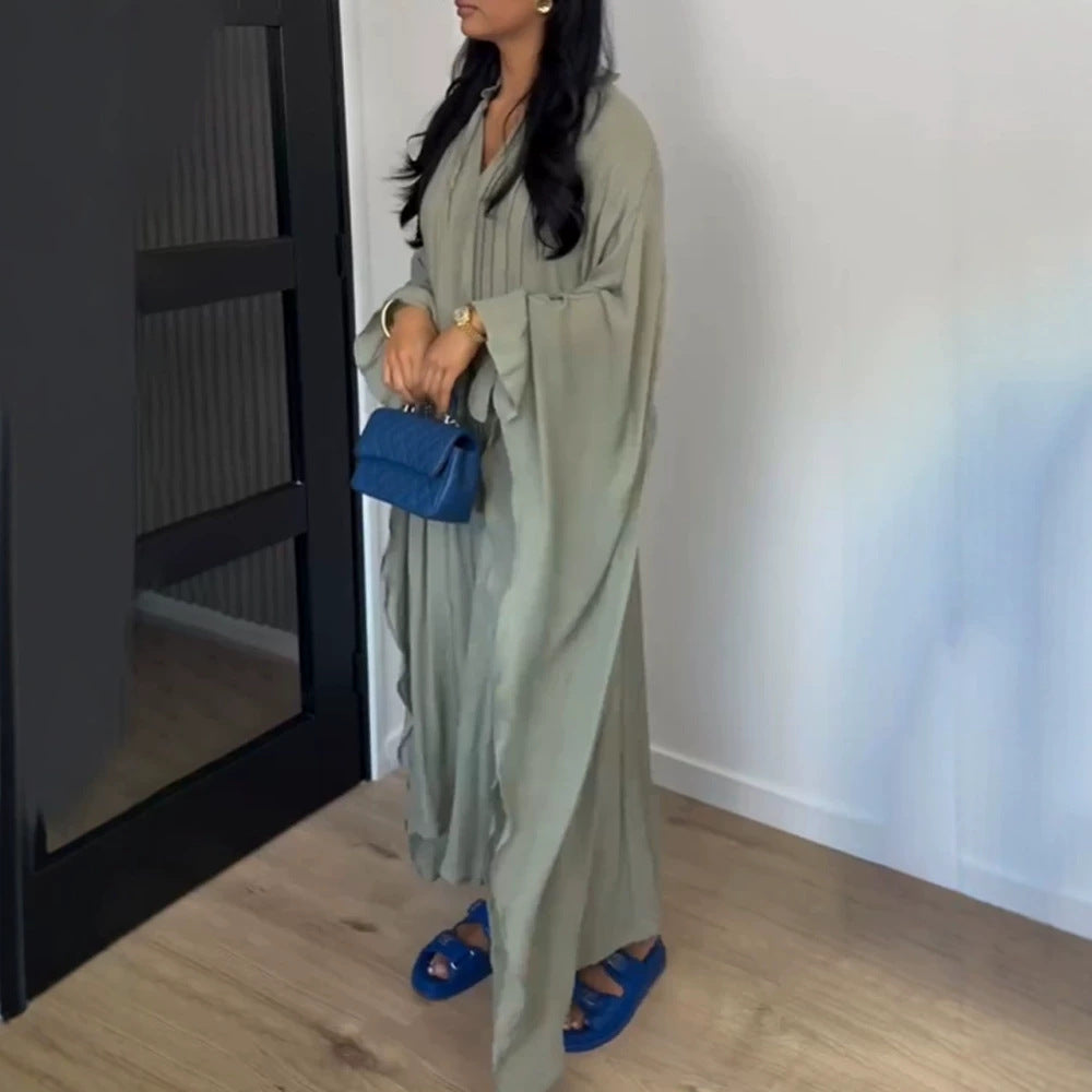 Women's maxi dress in kaftan style with ruffled collar, tie straps, and voluminous sleeves Mune Fashion
