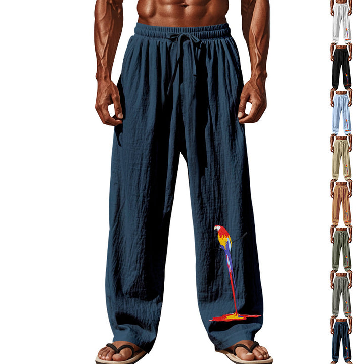 Men's casual linen lounge pants with elastic comfort waistband, drawstring, wide leg, and decorative parrot embroidery Mune Fashion