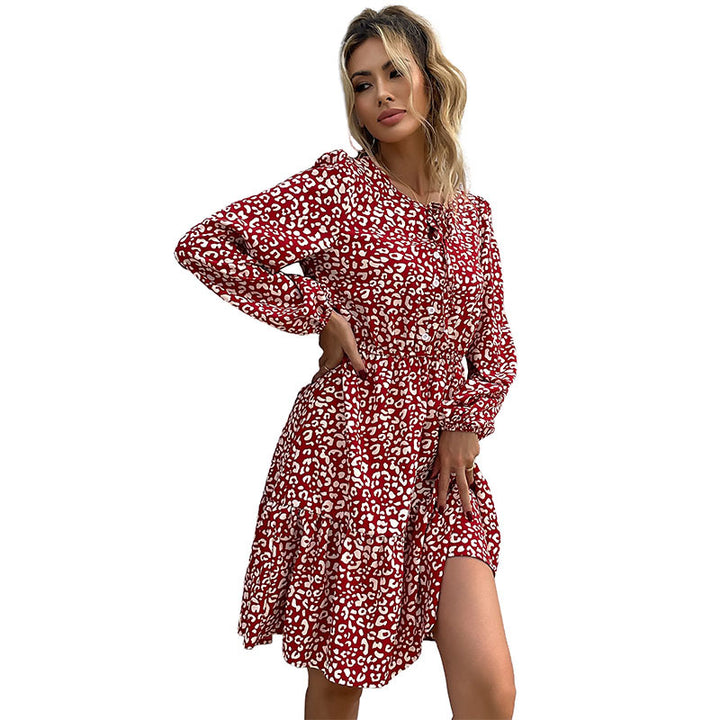 Women's leopard print ruffle dress with tie bow, elastic waistband, and long sleeves Mune Fashion