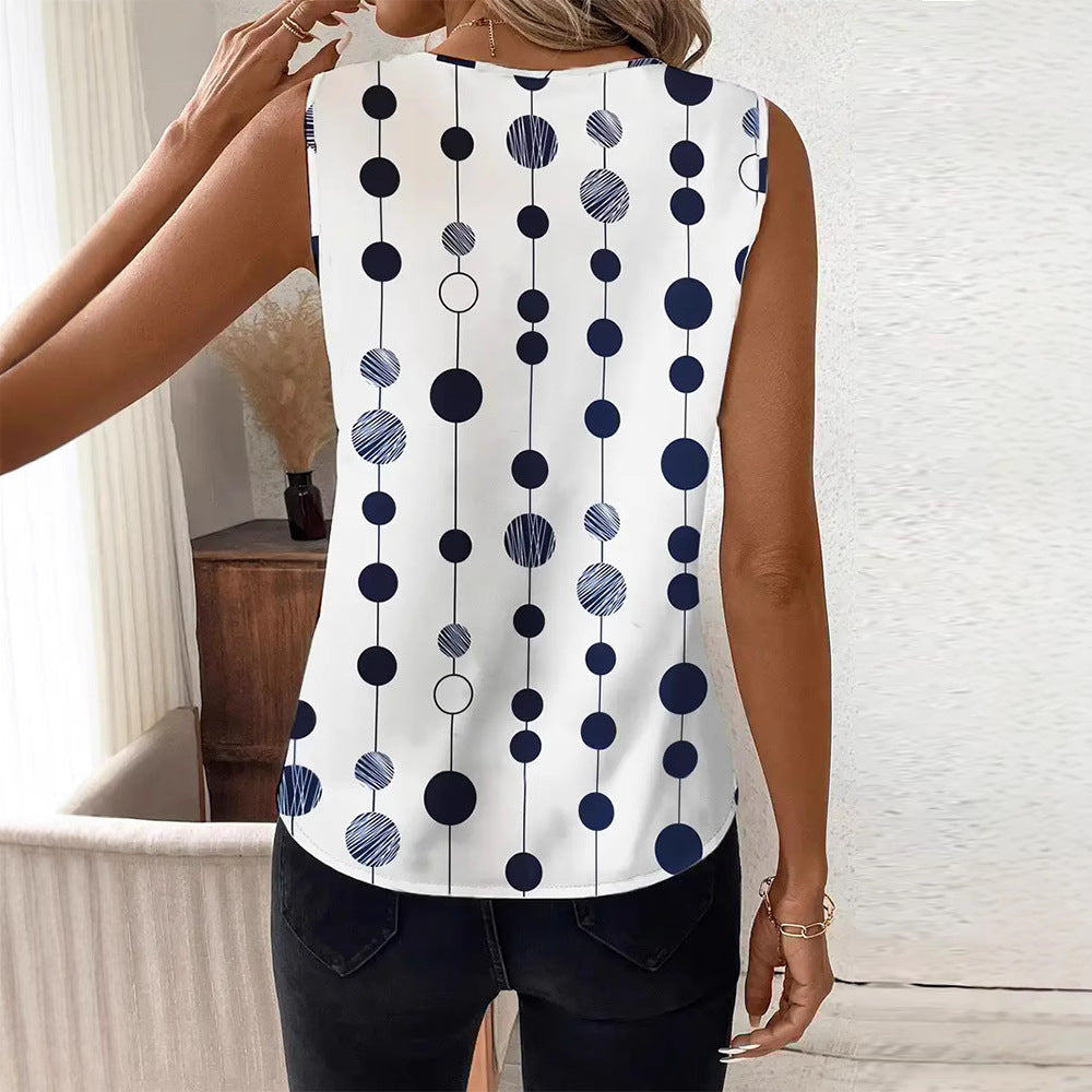 Women's V-neck blouse top with vertical polka dot pattern and subtle center seam Mune Fashion