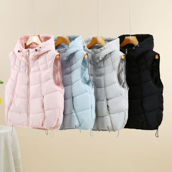 Women’s lightweight quilted thermal vest with ergonomic hood trim and adjustable hem Mune Fashion