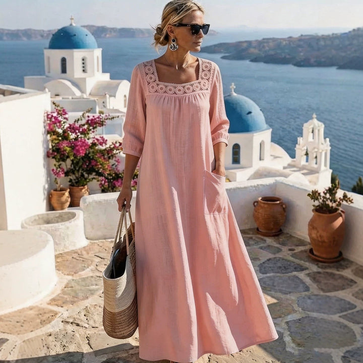 Ladies max dress with elegant round neckline and practical pockets Mune Fashion