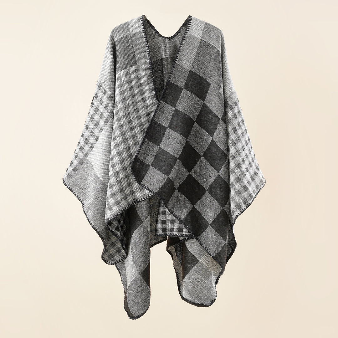 Women's oversized cape in plaid mix made of wool blend with crochet trim Mune Fashion