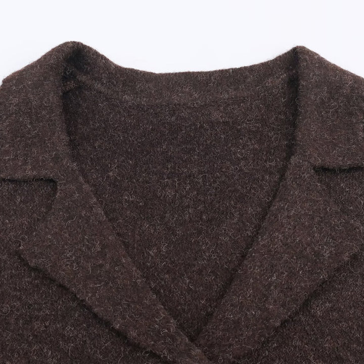 Women's short tailored wool look jacket with lapel collar and decorative floral buttons Mune Fashion