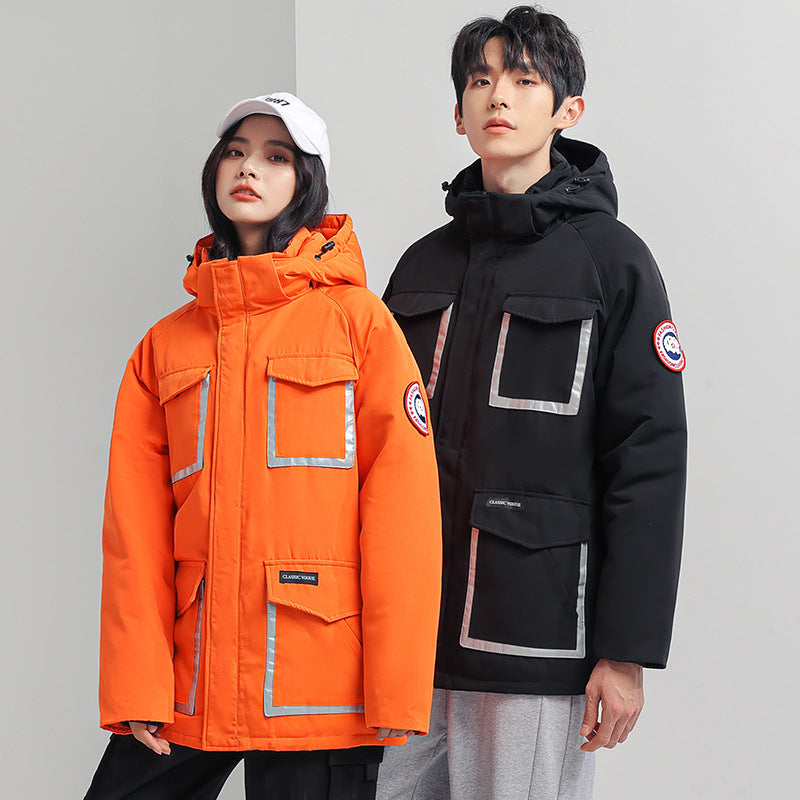 Women's parka jacket with hood, padded, reflective details and large cargo pockets Mune Fashion