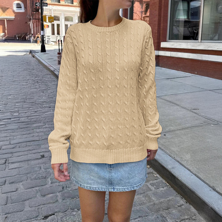 Women's large knitted cable knit sweater with round neckline, relaxed oversized fit, and ribbed cuffs Mune Fashion