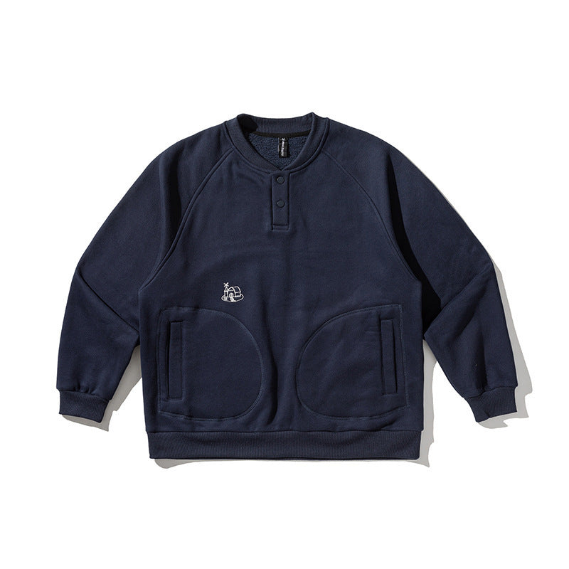 Unisex Oversize Henley Sweatshirt with raglan sleeves, button placket, and distinctive round pockets Mune Fashion