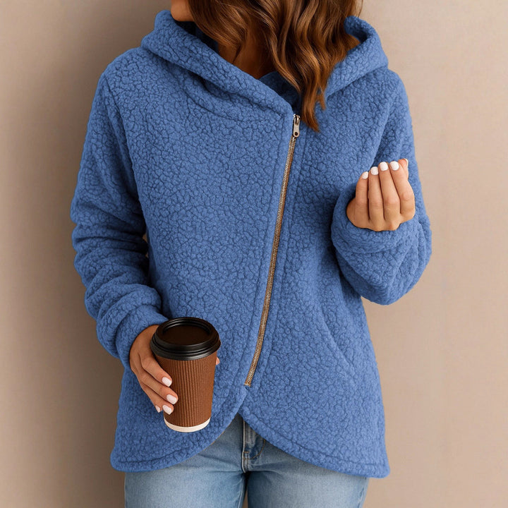 Women's teddy fleece jacket with asymmetrical zipper, hood and curved hem Mune Fashion
