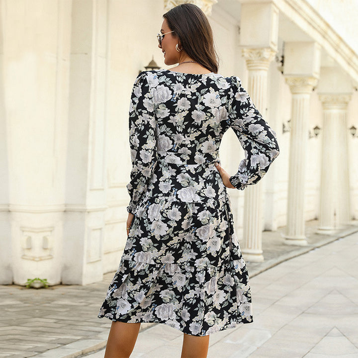 Women's midi dress with tiered skirt, V-neck, waist seam and gathered sleeve cuffs Mune Fashion