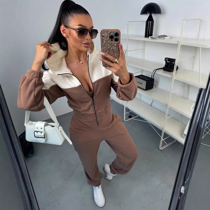 Ladies cozy fleece jumpsuit with hood, full-length zipper and elastic cuffs Mune Fashion