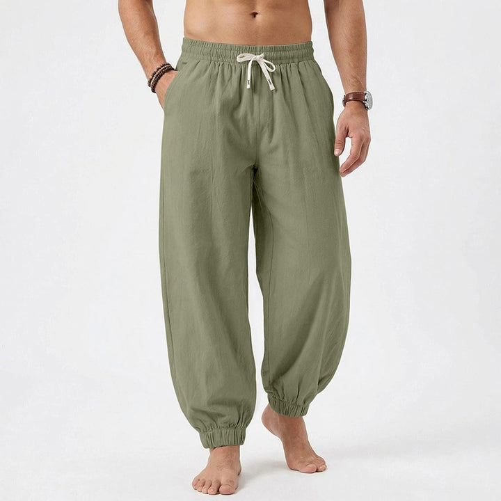 Men's relaxed harem pants made of linen blend with elastic drawstring waistband and gathered ankle closures Mune Fashion