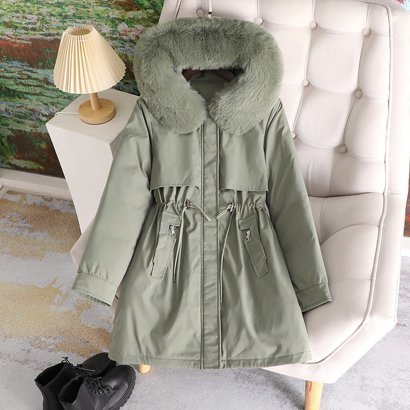 Women's mid-length water-repellent parka with voluminous faux fur collar, waistband drawstring, and multifunctional flap pockets Mune Fashion