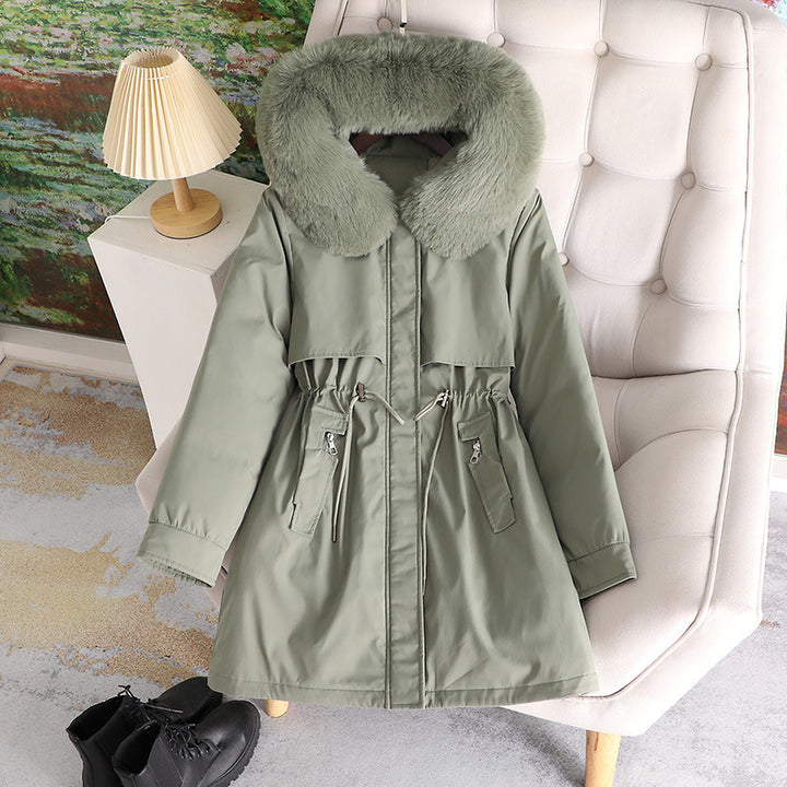 Women's mid-length water-repellent parka with voluminous faux fur collar, waistband drawstring, and multifunctional flap pockets Mune Fashion