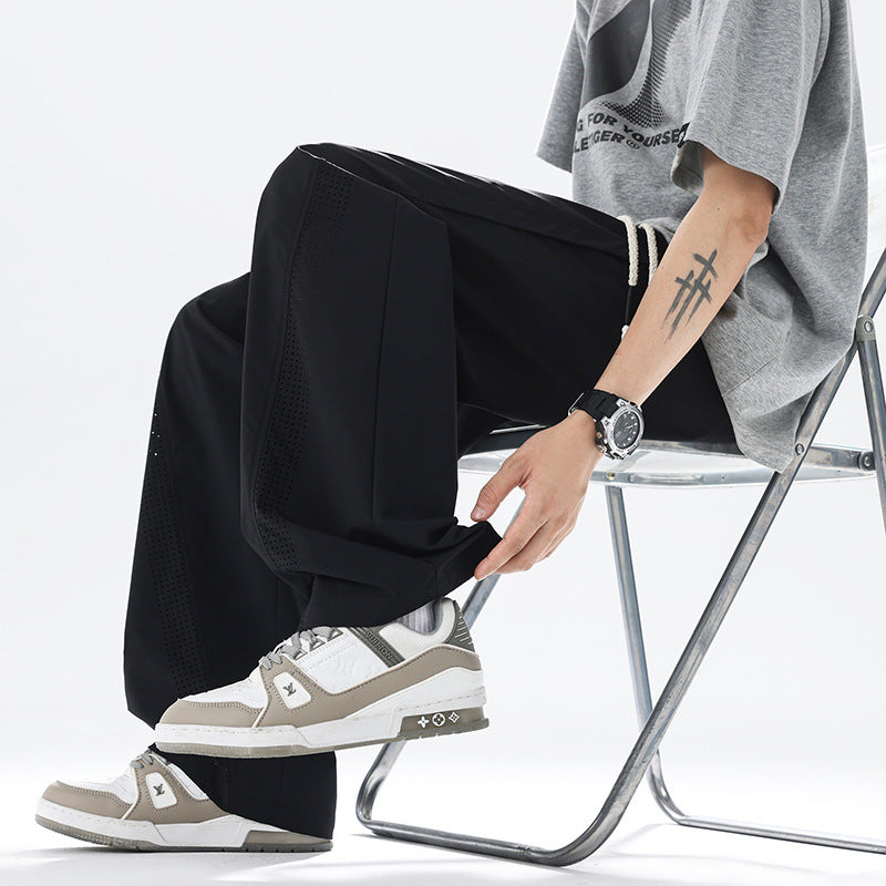Men's sporty leisure pants with innovative mesh inserts