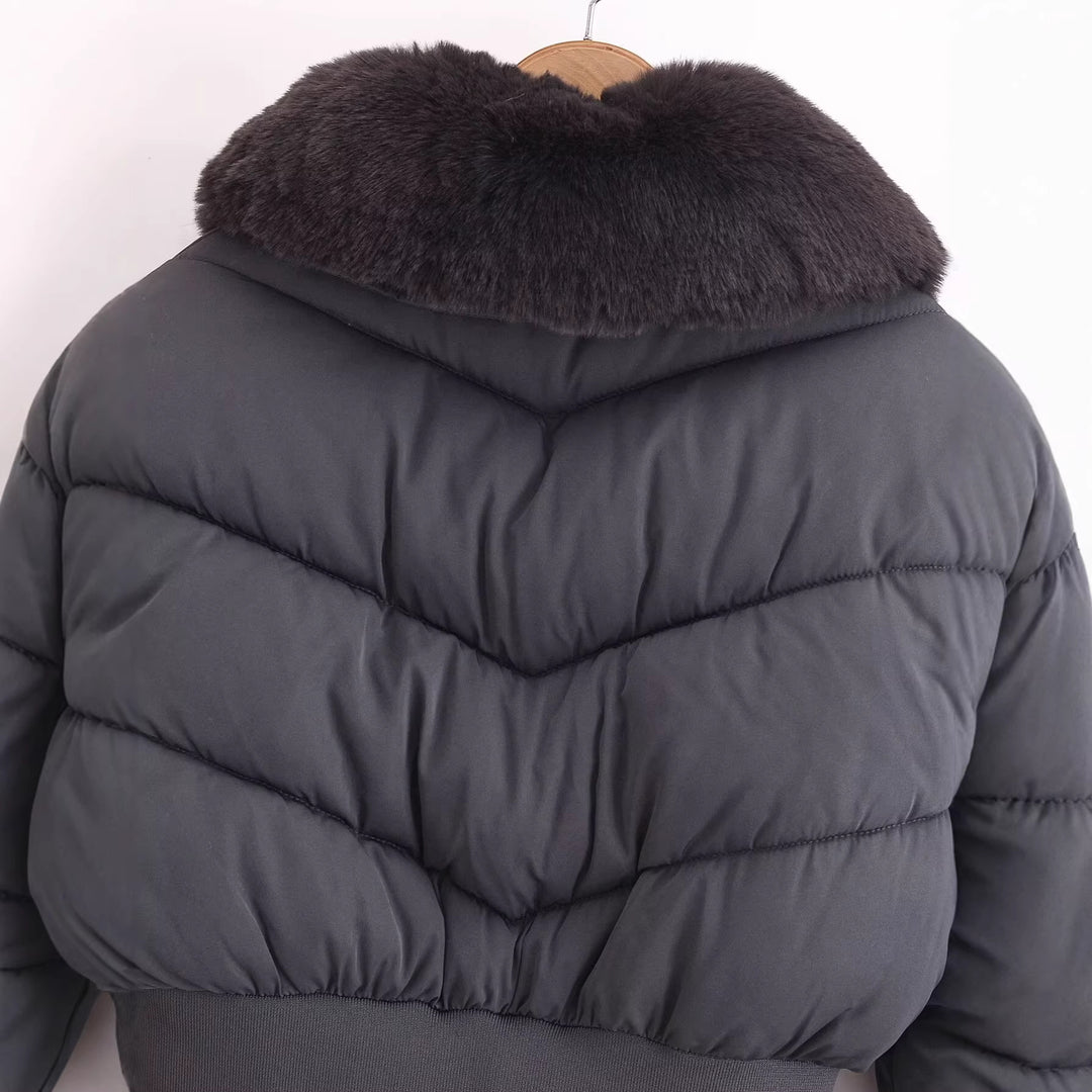 Women short-cut quilted bomber jacket with extra large faux fur collar and tailored ribbed waistband Mune Fashion