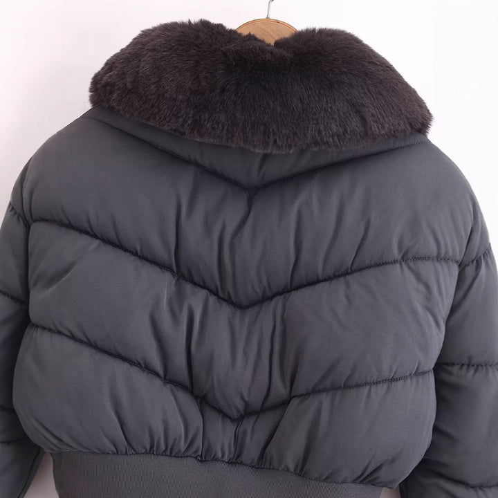 Women short-cut quilted bomber jacket with extra large faux fur collar and tailored ribbed waistband Mune Fashion