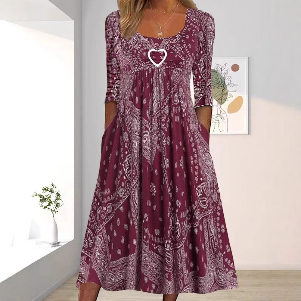 Women's maxi dress with paisley bandana pattern, empire seam, gathered underbust area, and side pockets Mune Fashion