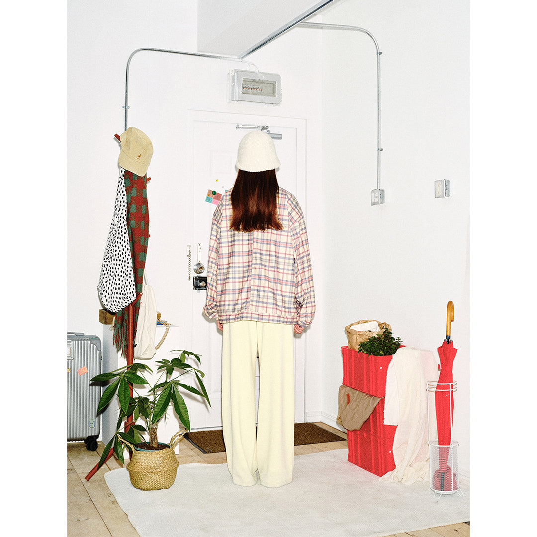 Women's lightly padded checkered boxy bomber jacket with drawstring hem, wooden bead cord and patch pockets Mune Fashion