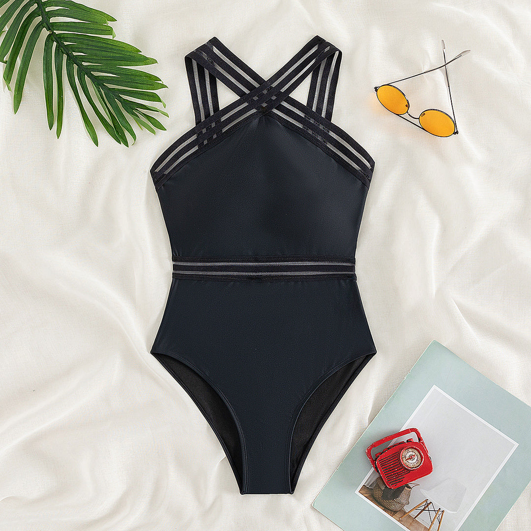 Ladies sporty jumpsuit with crossed straps and figure-flattering cut Mune Fashion