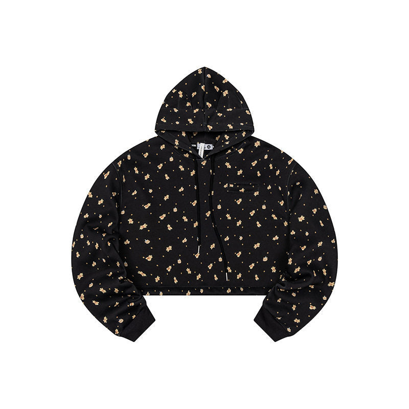 Women's Cropped Hoodie Sweatshirt with Allover Floral Print, Chest Pocket and Ruffled Hem Mune Fashion