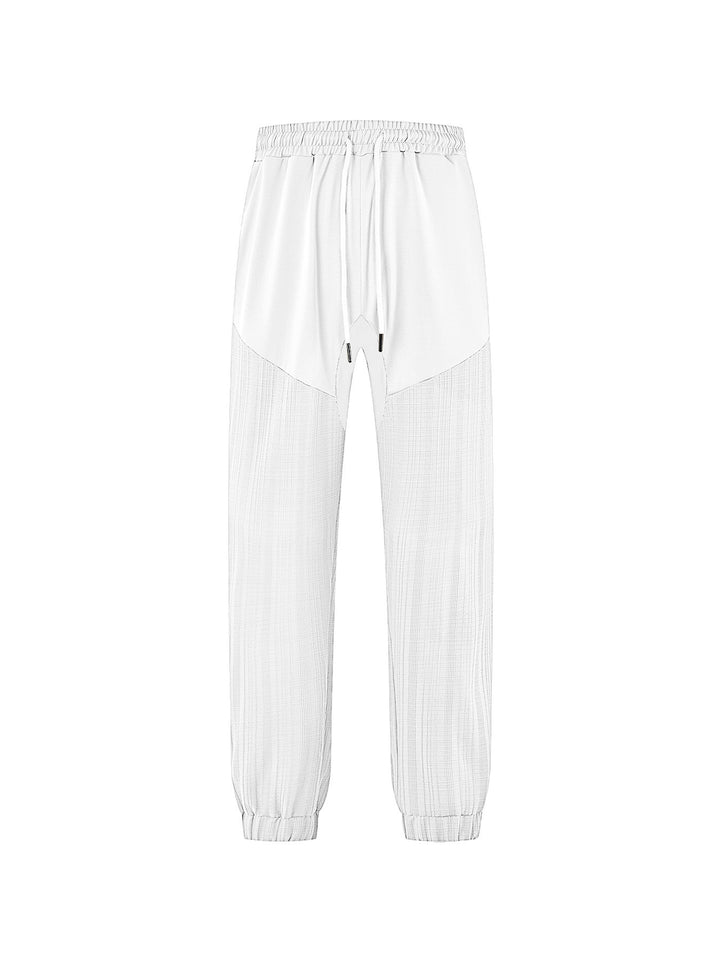 Men's slim-fit jogging pants with elastic drawstring waistband and textured knee panel Mune Fashion
