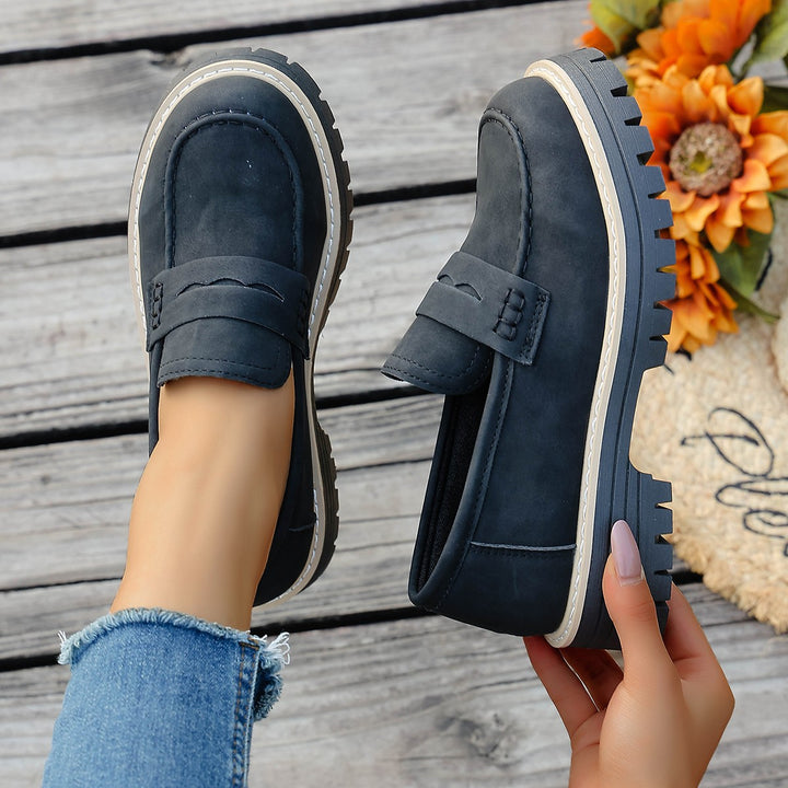 Men's robust penny loafers with distinctive profile sole, handcrafted decorative stitching, and padded comfort footbed Mune Fashion