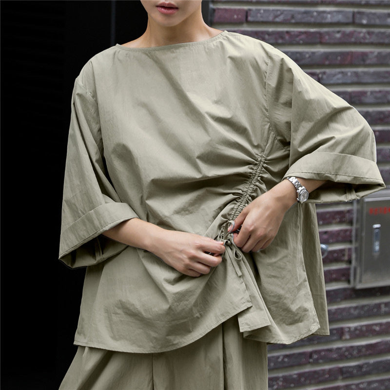Women's oversized blouse with side cord gathering, bateau neckline, and wide sleeves Mune Fashion