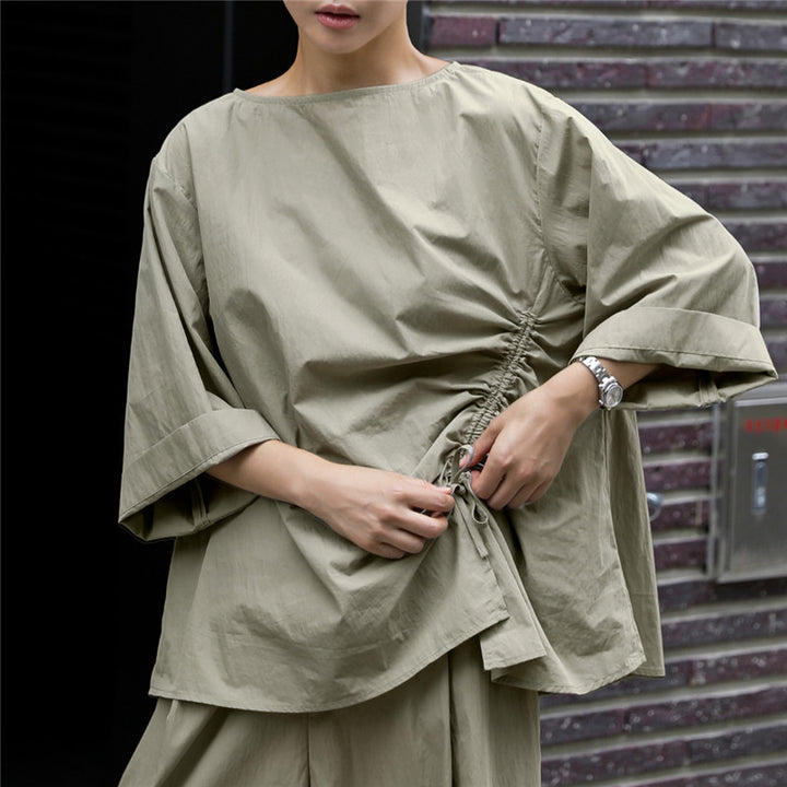 Women's oversized blouse with side cord gathering, bateau neckline, and wide sleeves Mune Fashion