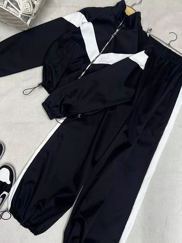 Women's satin track set with stand-up collar, chevron stripes and drawstring Mune Fashion