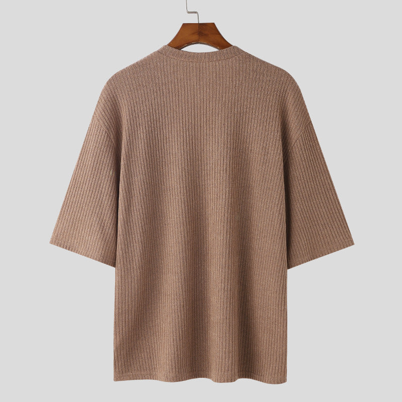 Women's oversized V-neck knit top with textured ribbed look and half-length sleeves Mune Fashion