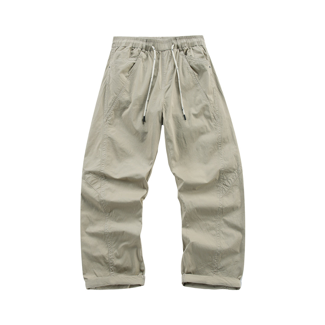 Men's Light Relaxed-Fit Trousers with Drawstring, Slanted Side Pockets and Panel Seams Mune Fashion