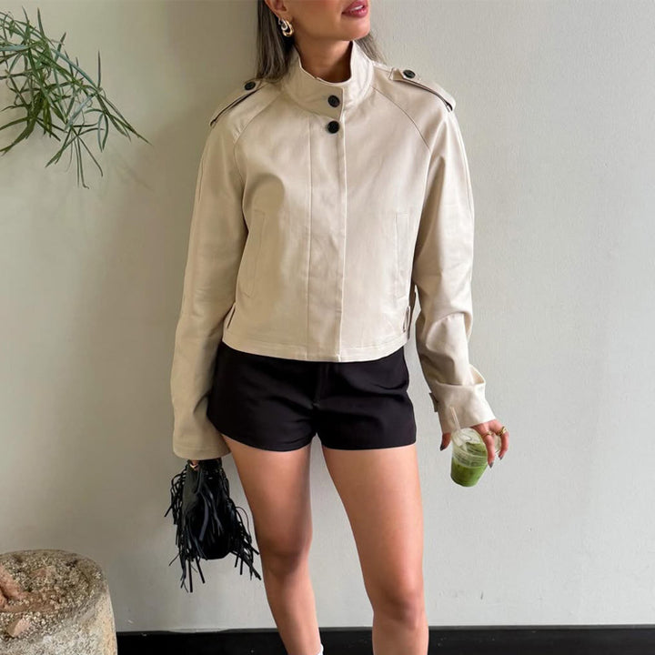 Women's short boxy trench-style jacket with high stand-up collar and shoulder flaps Mune Fashion
