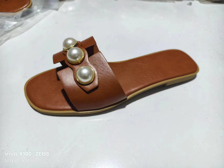 Ladies' flat slide sandal with large decorative pearls and gold-trimmed applications padded comfort footbed Mune Fashion
