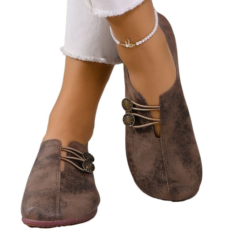 Ladies nan elegant comfort slipper in moccasin style with elastic decorative cord and button detail Mune Fashion