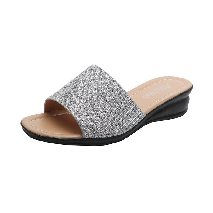 Women's glitter slide sandals with wide strap front, open toe area, cushioned comfort footbed, and lightweight wedge heel Mune Fashion