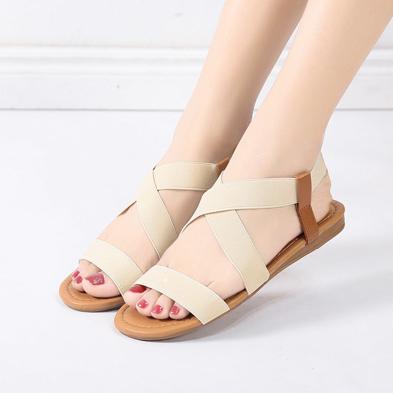 Women's flat elastic strap sandals with crossed stretch bands and padded comfort footbed Mune Fashion
