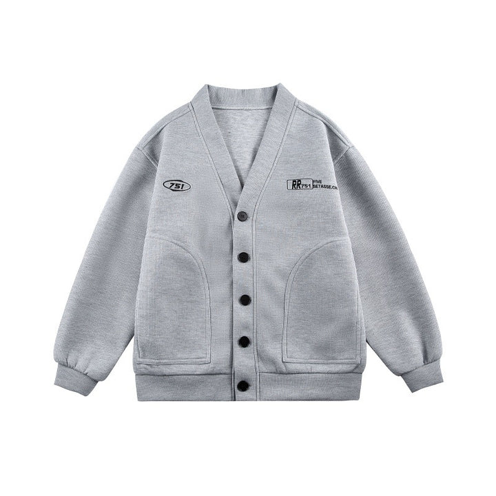 Unisex Boxy knit cardigan in waffle knit with V-neck, continuous button placket, and applied round pockets Mune Fashion