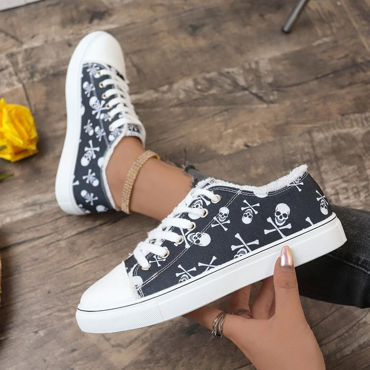 Women’s casual platform sneaker with skull print, frayed canvas trim and reinforced toe cap Mune Fashion