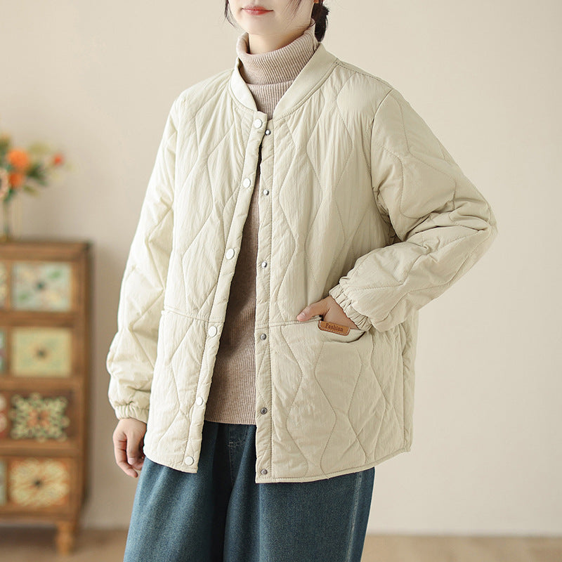 Women's lightweight padded transitional jacket with oversized cut, elastic sleeve cuffs and concealed snap button placket Mune Fashion