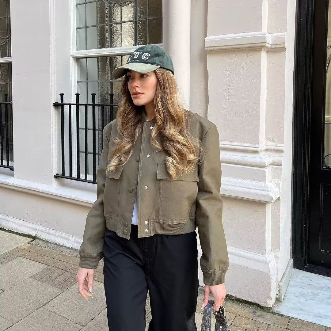 Women’s short-cut faux leather bomber jacket with patch flap pockets and ribbed hems Mune Fashion
