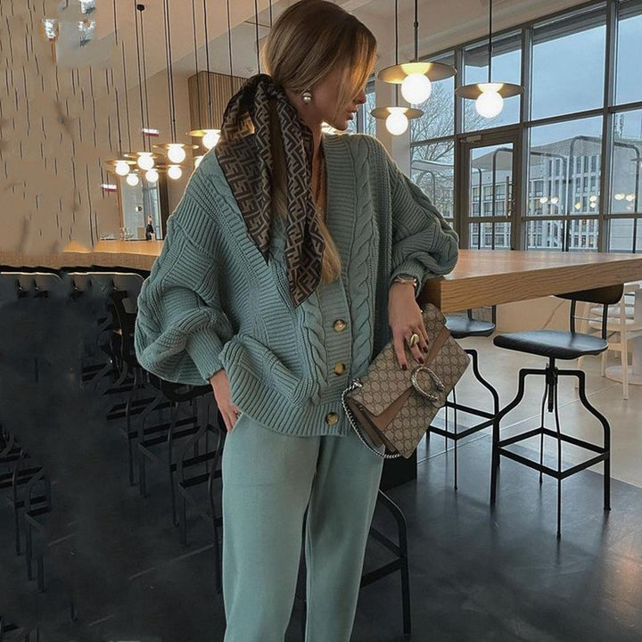 Women's cozy oversized knit set consisting of cable pattern cardigan and tailored knit joggers Mune Fashion