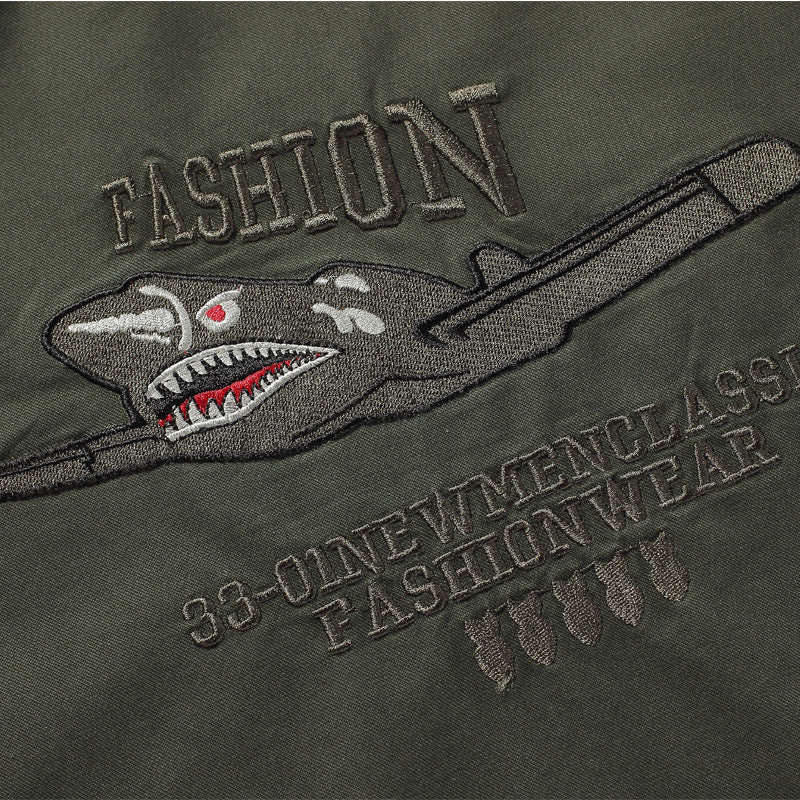 Men's military-inspired bomber jacket with embroidered patches, sleeve pocket, and elastic ribbed cuffs Mune Fashion