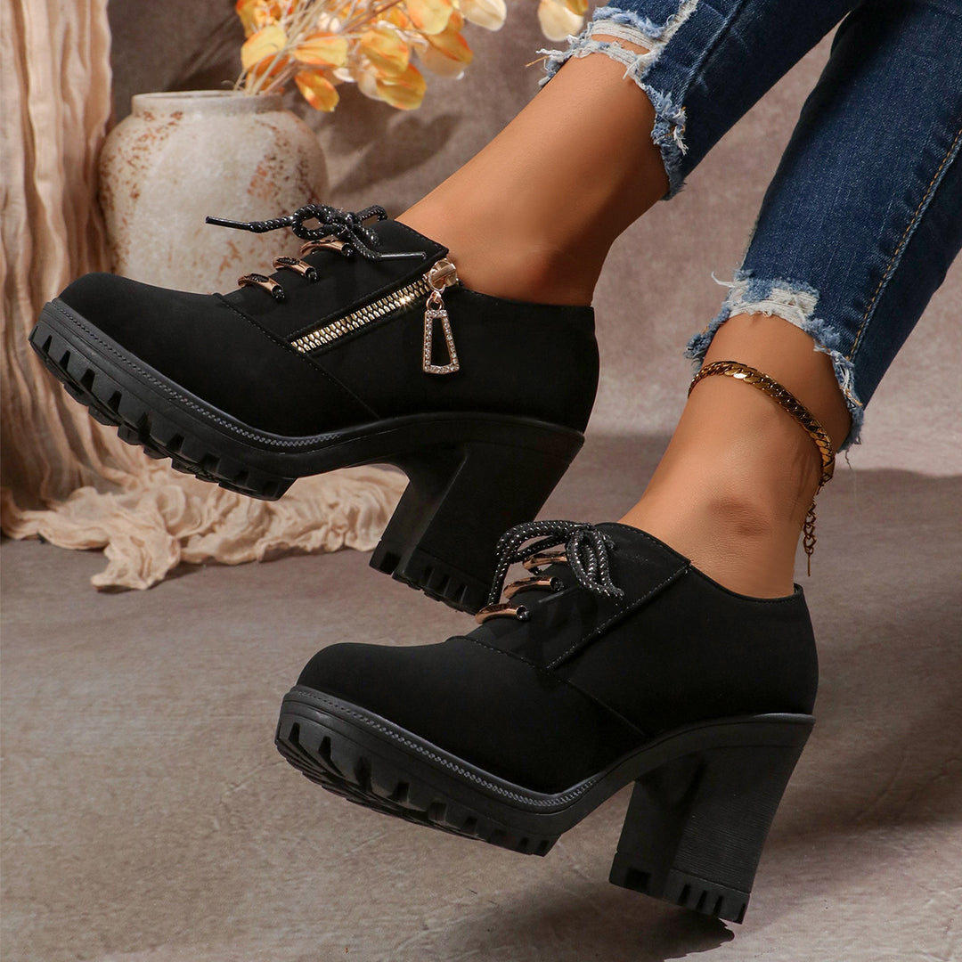 Women's elegant lace-up booties with sturdy block heel, side zipper, and decorative pendant Mune Fashion