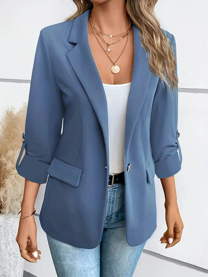 Women's tailored business blazer with cap sleeves, turned-up cuffs, and decorative buttons Mune Fashion