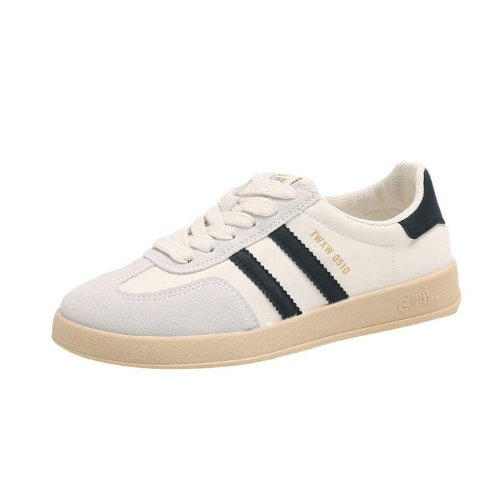Ladies sporty sneakers with fashionable stripes and cushioned sole Mune Fashion