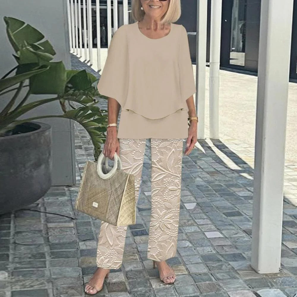 Women's layered tunic with cape sleeves and ankle-length straight leg pants with graphic print Mune Fashion