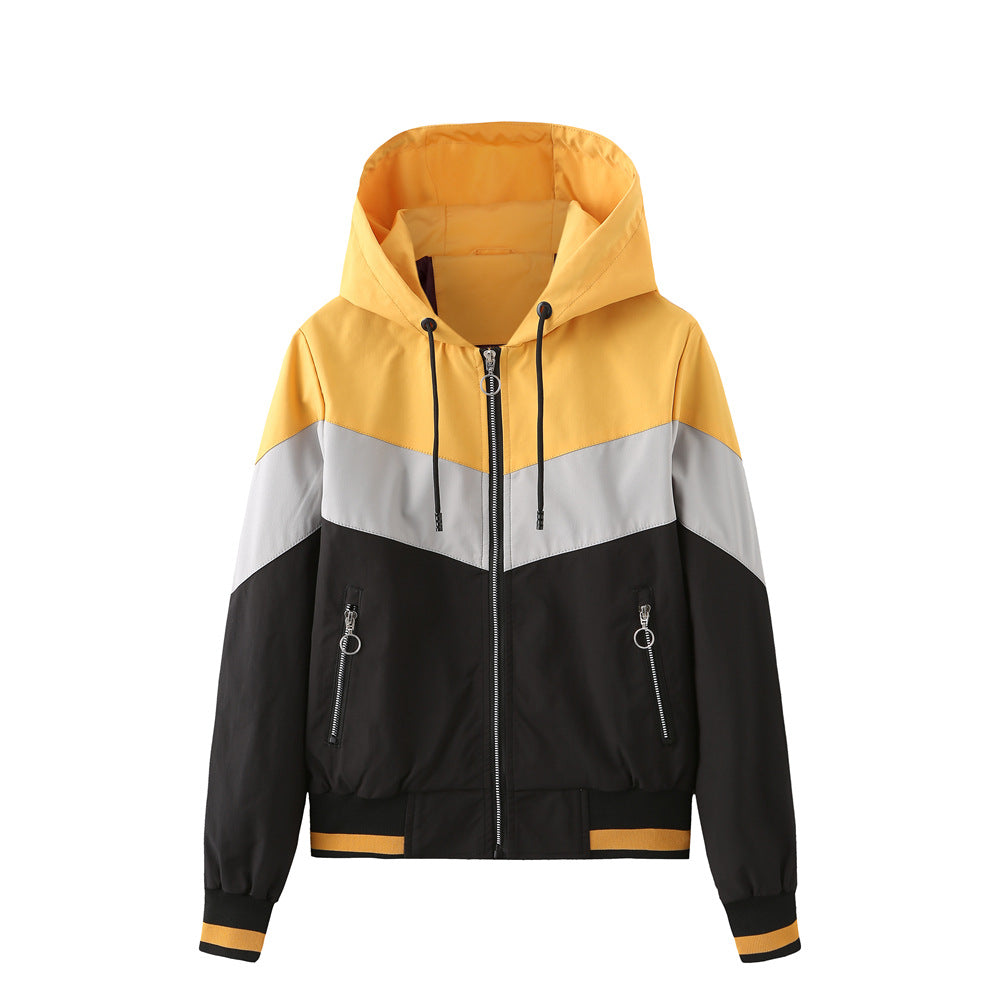 Women's lightweight windbreaker jacket with hood, block panel design, zippered pockets, and elastic hem Mune Fashion