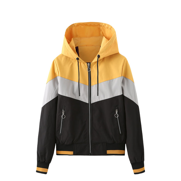 Women's lightweight windbreaker jacket with hood, block panel design, zippered pockets, and elastic hem Mune Fashion
